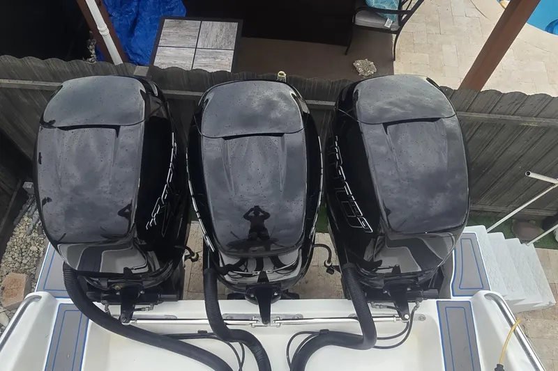 Slide: The Image of Engine compartment of 2016 Extreme Boats 38 Cuddy Cabin, showing wiring and components. - 7