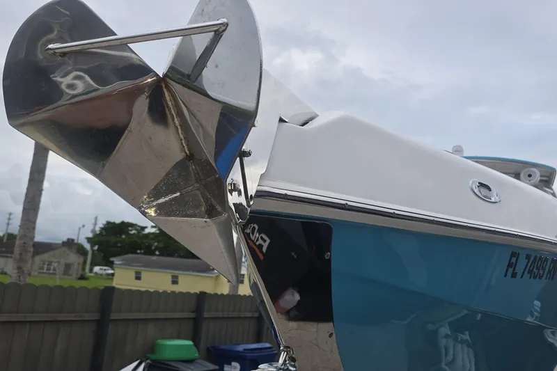 Slide: The Image of Close-up of a 2016 Extreme Boats 38 Cuddy Cabin engine and transom. - 72