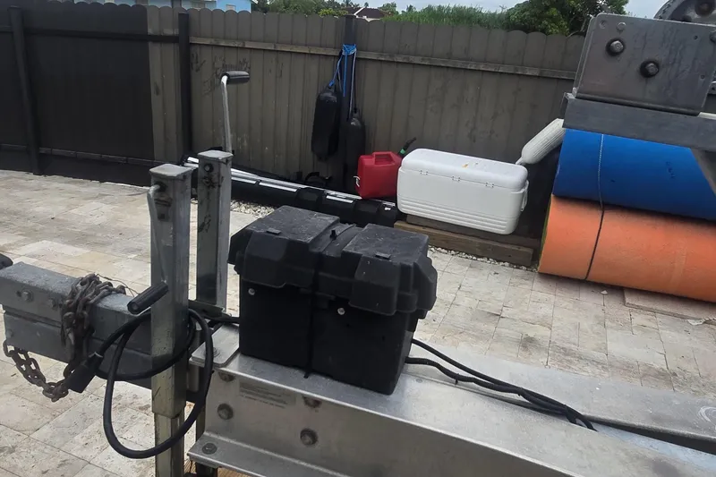 Slide: The Image of 2016 Extreme Boats 38 Cuddy Cabin, XC38 Express logo on blue and white hull. - 74