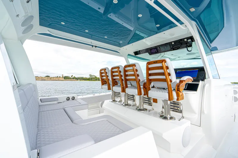 Slide: The Image of Luxurious interior of 2026 HCB 56 Suenos GIX yacht with elegant seating and modern controls. - 21