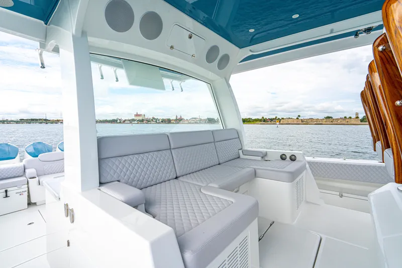 Slide: The Image of Luxurious seating area on the 2026 HCB 56 Suenos GIX yacht, overlooking serene waters. - 22