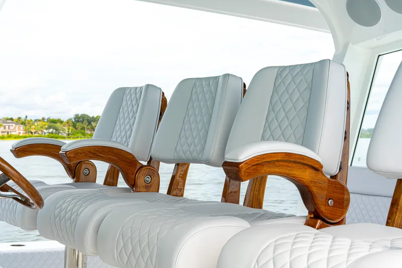Slide: The Image of Luxurious seating on 2026 HCB 56 Suenos GIX yacht with elegant wood and leather design. - 30
