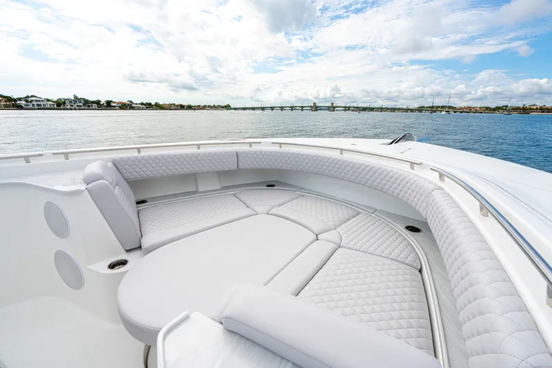 Slide: The Image of Luxurious seating on the 2026 HCB 56 Suenos GIX yacht, with scenic water view. - 38