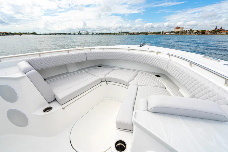 Slide: The Image of Luxurious seating on the 2026 HCB 56 Suenos GIX yacht, with scenic waterfront view. - 39