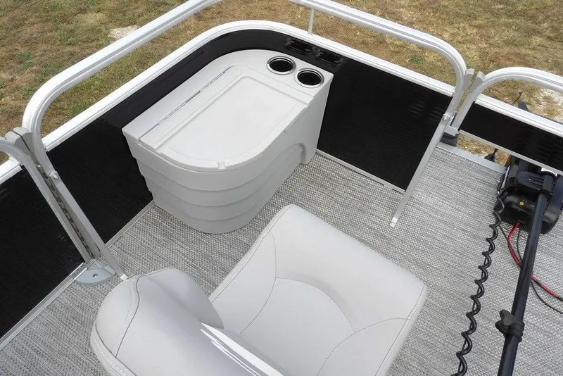 Slide: The Image of 2023 Bennington 20 SVF pontoon boat interior with seating and storage. - 11