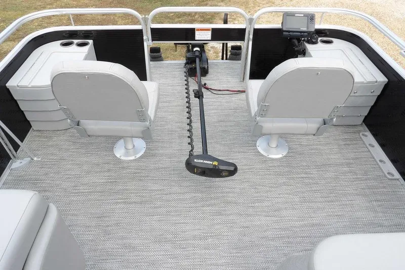 Slide: The Image of 2023 Bennington 20 SVF boat interior with dual seats and fishing equipment. - 13