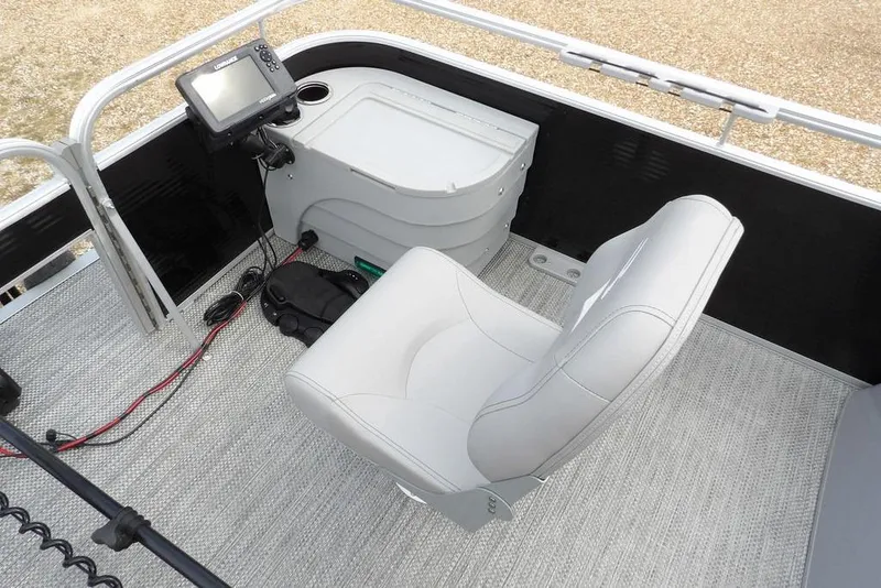 Slide: The Image of 2023 Bennington 20 SVF boat interior with a swivel seat and control panel. - 15
