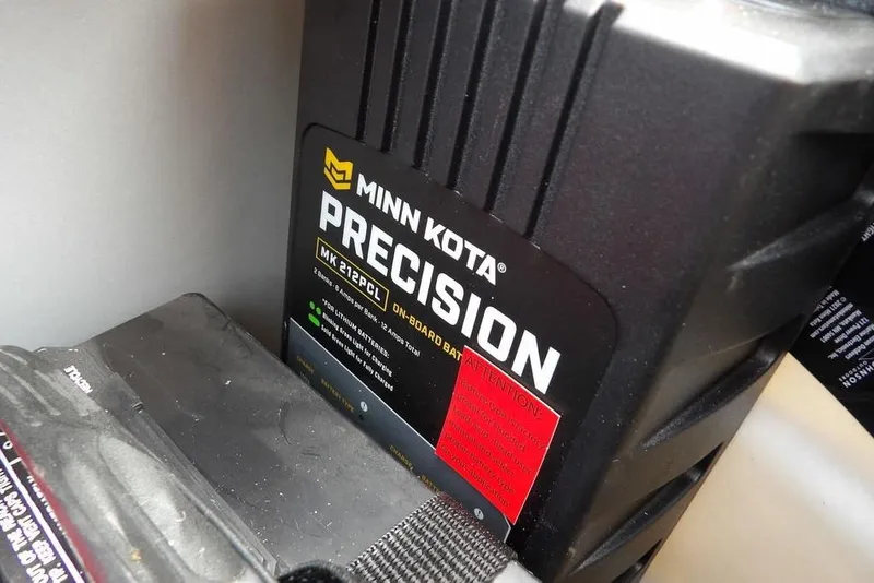 Slide: The Image of Minn Kota Precision charger in a 2023 Bennington 20 SVF boat. - 16