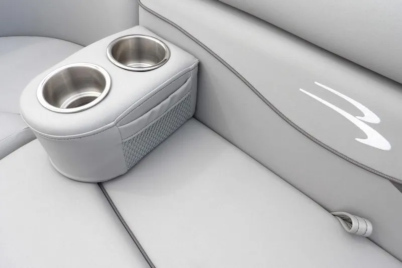 Slide: The Image of 2023 Bennington 20 SVF boat interior with dual cup holders and sleek gray upholstery. - 17