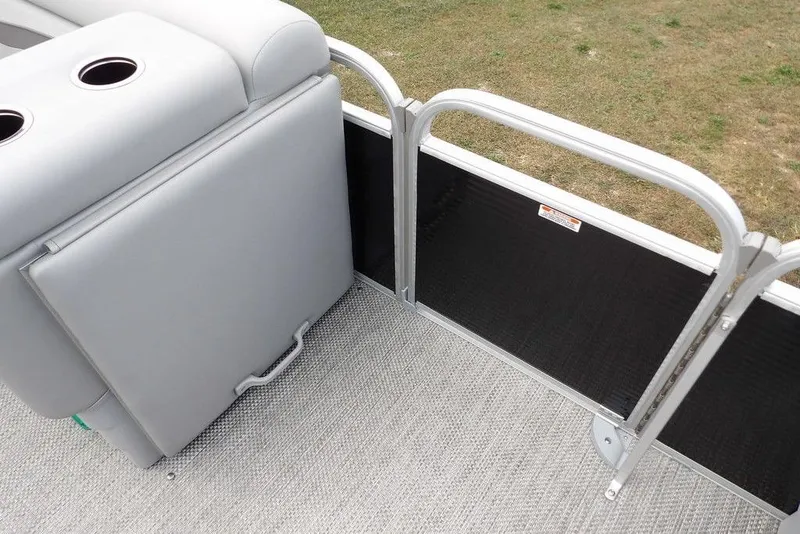 Slide: The Image of 2023 Bennington 20 SVF pontoon boat interior with gray seating and cup holders. - 22
