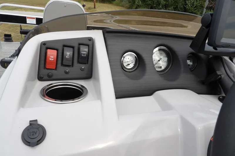 Slide: The Image of Dashboard of 2023 Bennington 20 SVF boat with switches and gauges. - 26