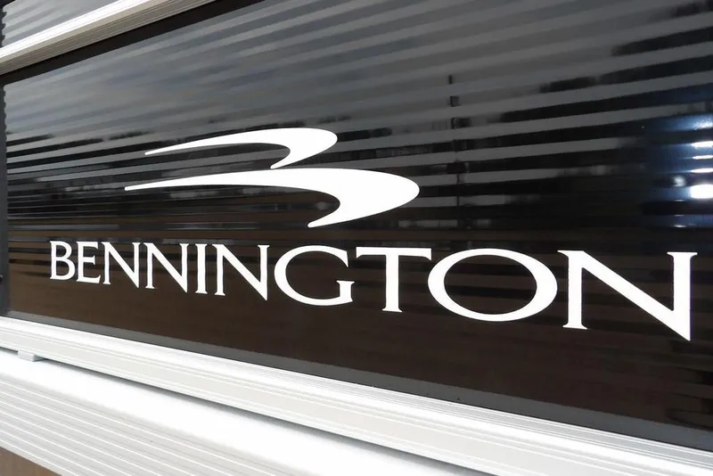 Slide: The Image of Bennington 20 SVF 2023 logo on sleek black surface. - 46