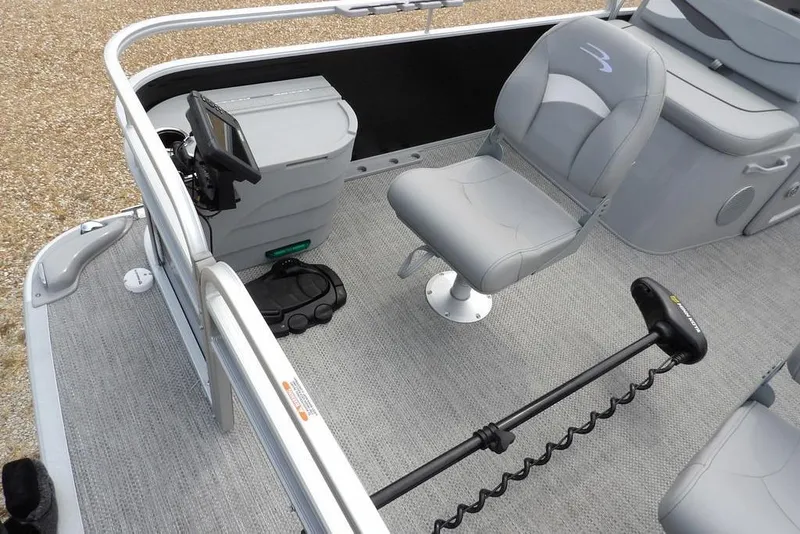 Slide: The Image of 2023 Bennington 20 SVF pontoon boat interior with gray seating and fishing equipment. - 9