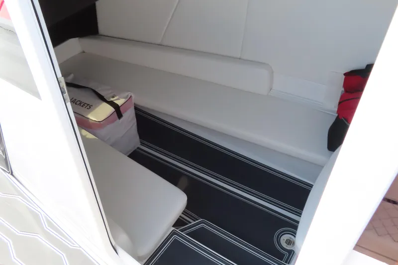 Slide: The Image of 2022 Sunsation 32CCX cabin interior with seating and life jackets. - 14