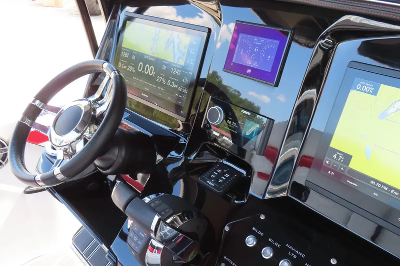 Slide: The Image of 2022 Sunsation 32CCX dashboard with advanced navigation and control systems. - 17