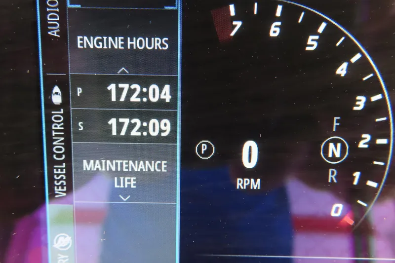 Slide: The Image of Dashboard of 2022 Sunsation 32CCX showing engine hours and RPM gauge. - 21