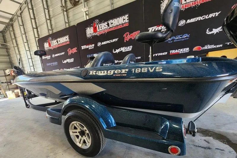 Slide: The Image of 2007 Ranger 188VS Intracoastal boat in showroom, featuring sleek design and vibrant blue color. - 4