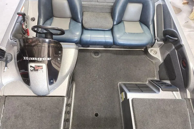 Slide: The Image of 2007 Ranger 188VS Intracoastal boat interior with steering wheel and seating. - 7