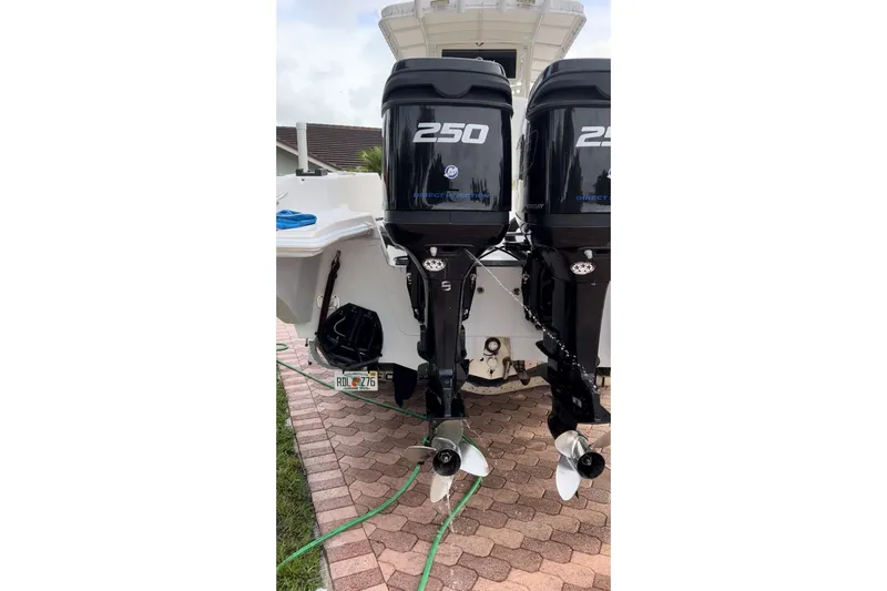 Slide: The Image of 2002 Fountain 29 Center Console with twin 250 horsepower outboard engines. - 5