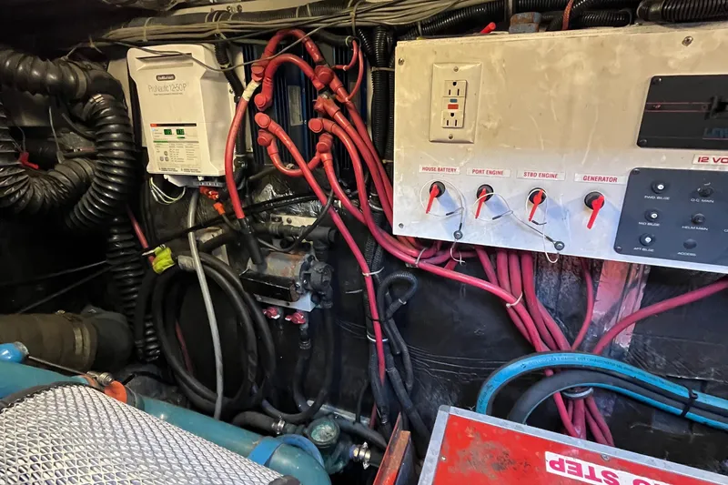 Slide: The Image of Engine room of a 1994 Tiara Yachts 4000 Express with electrical panel and wiring. - 27