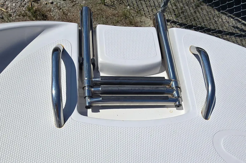 Slide: The Image of 2011 Tahoe Q5i boat swim platform with stainless steel folding ladder and handles. - 17