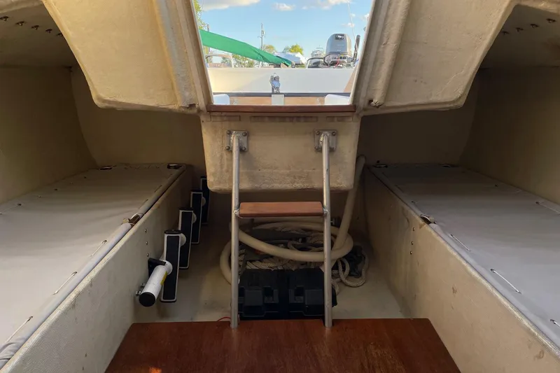 Slide: The Image of Interior of 1985 S2 K sailboat with twin berths and ladder. - 14