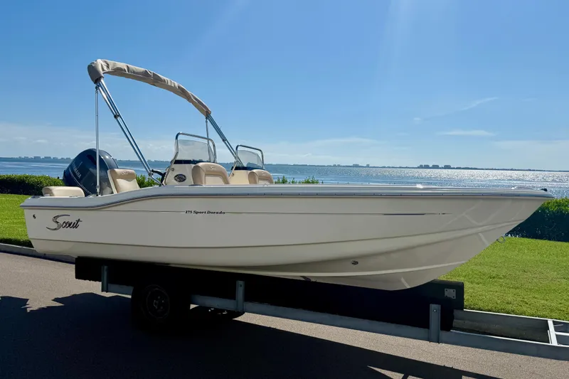 The Image of 2026 Scout 175 Sport Dorado boat on trailer by waterfront. - 0