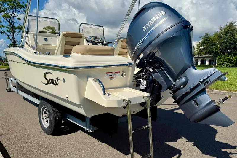 Slide: The Image of 2026 Scout 175 Sport Dorado boat with Yamaha outboard motor on trailer. - 8