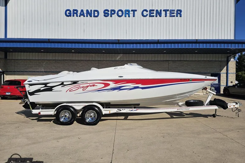 The Image of 2005 Baja 23 Outlaw boat on trailer at Grand Sport Center. - 1