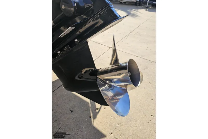 Slide: The Image of Close-up of a 2005 Baja 23 Outlaw boat propeller on a sunny day. - 32