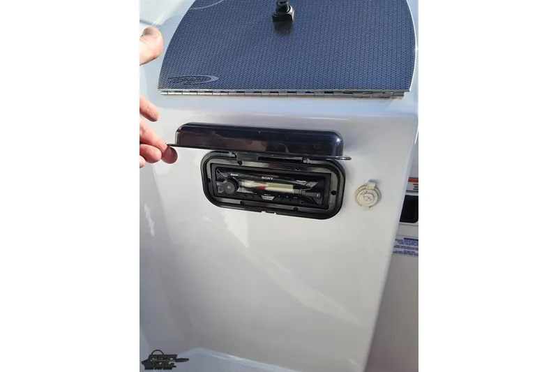 Slide: The Image of 2005 Baja 23 Outlaw boat with Sony stereo system installation. - 55