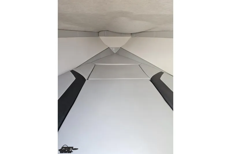 Slide: The Image of Interior cabin of 2005 Baja 23 Outlaw boat, featuring sleek, modern design. - 62