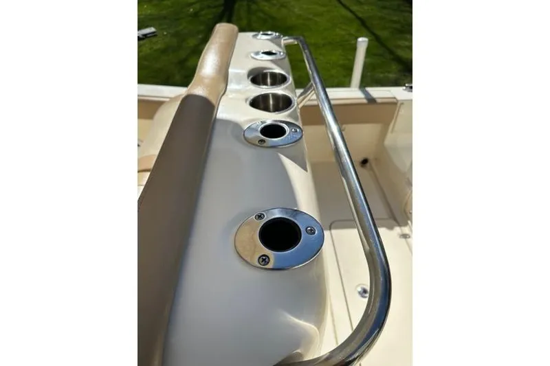 Slide: The Image of 2021 Scout 235 XSF boat rod holders and railing detail. - 3
