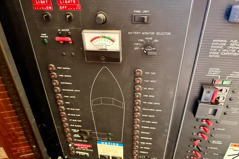 Slide: The Image of Control panel of a 1998 Bayliner 3988 Command Bridge Motoryacht with Westerbeke generator controls. - 45