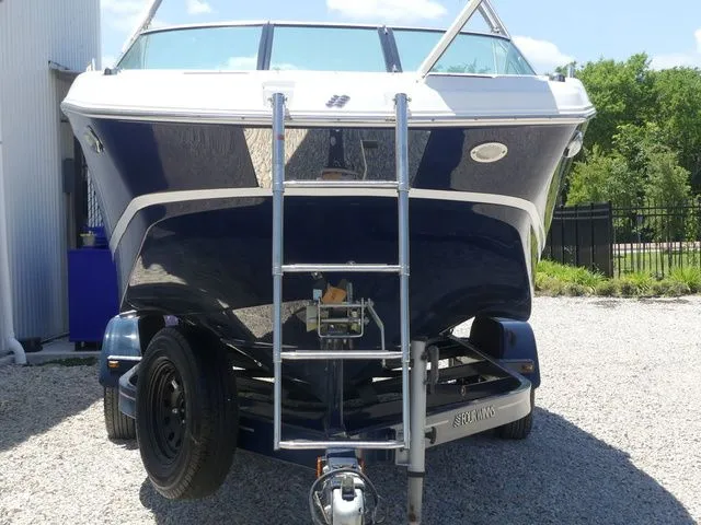 Slide: The Image of 2021 Four Winns HD3 boat on trailer, front view. - 20