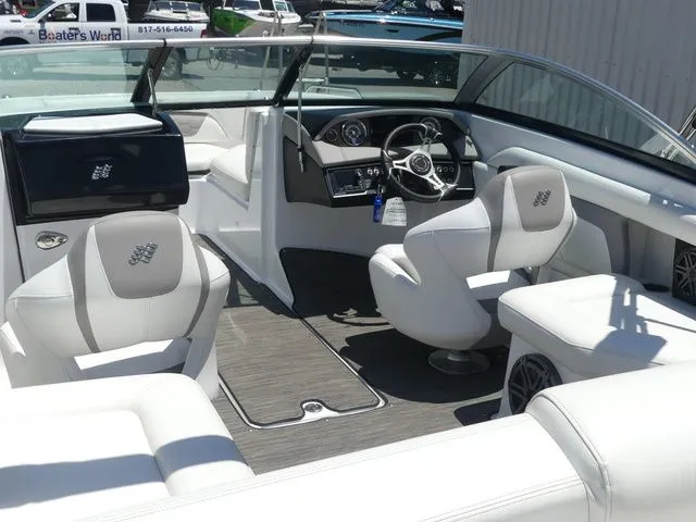 Slide: The Image of Interior of a 2021 Four Winns HD3 boat with luxurious seating. - 24