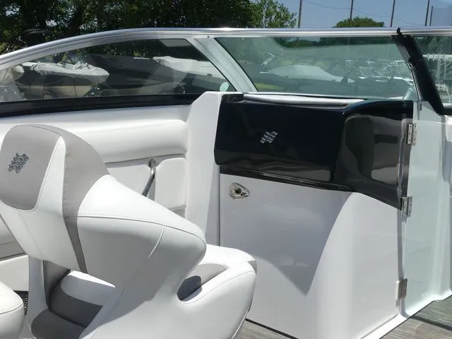 Slide: The Image of Interior of a 2021 Four Winns HD3 boat with white seating. - 26