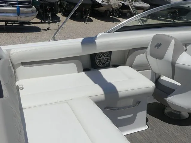 Slide: The Image of Interior of a 2021 Four Winns HD3 boat with white seating. - 28