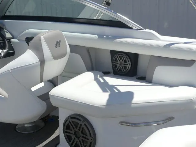 Slide: The Image of Interior of a 2021 Four Winns HD3 boat with white seating. - 29