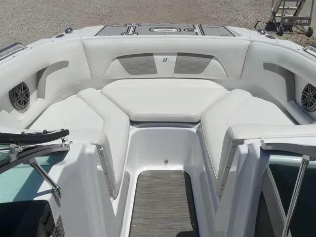 Slide: The Image of Interior view of a 2021 Four Winns HD3 boat with white upholstery. - 31