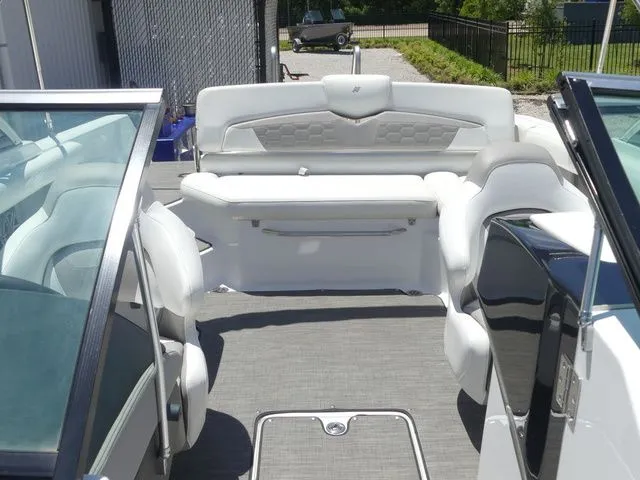 Slide: The Image of Interior of a 2021 Four Winns HD3 boat with white seating. - 32