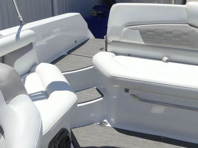 Slide: The Image of Interior of a 2021 Four Winns HD3 boat with white seating. - 33