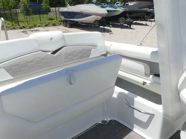 Slide: The Image of Interior of a 2021 Four Winns HD3 boat with white seating. - 35