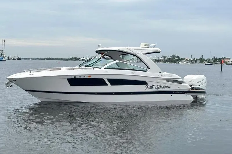 The Image of 2019 Four Winns H350 OB boat on calm water, side view. - 0