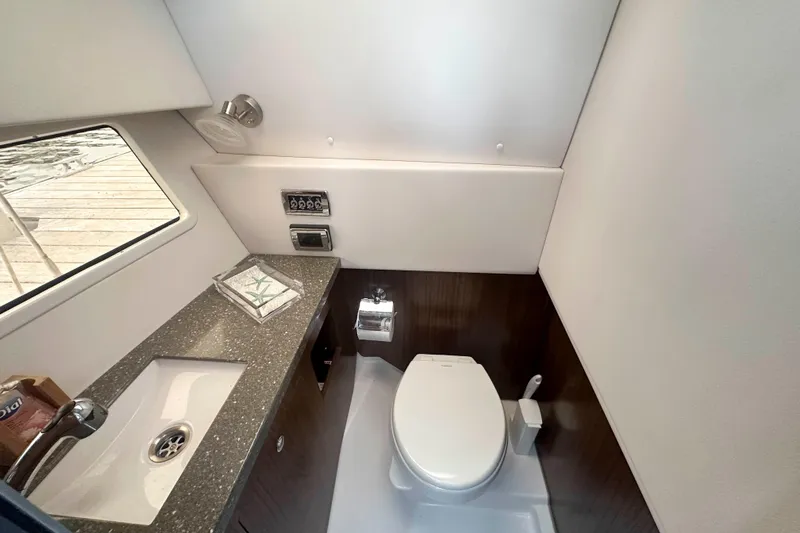 Slide: The Image of Luxurious 2019 Four Winns H350 OB boat bathroom with modern fixtures and elegant design. - 34
