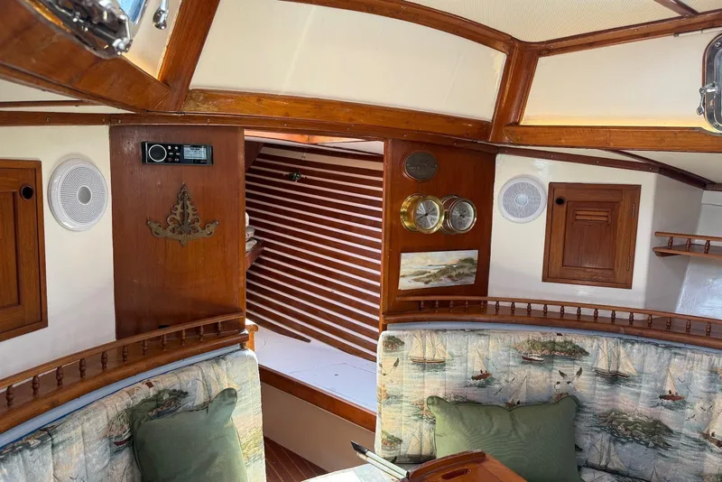 Slide: The Image of Interior of 1977 Cheoy Lee Offshore 41 ketch with nautical decor and wood accents. - 20