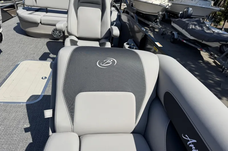 Slide: The Image of 2026 Barletta ARIA 22UC boat interior with gray seating and logo detailing. - 25
