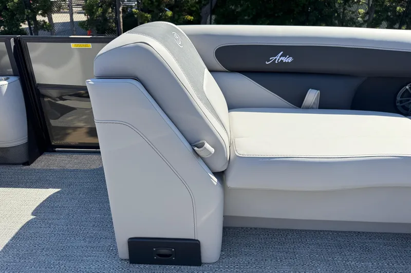 Slide: The Image of 2026 Barletta ARIA 22UC boat seat with sleek gray upholstery and "Aria" branding. - 26