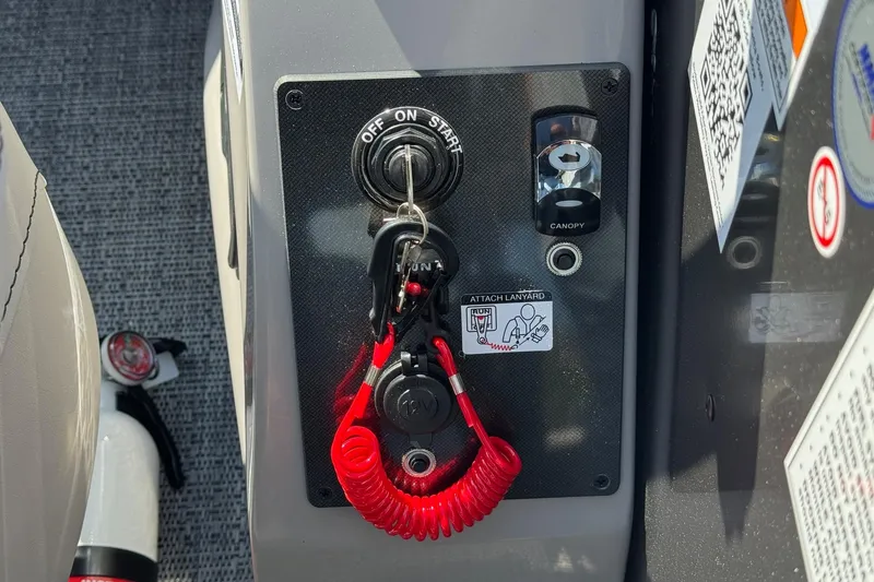 Slide: The Image of Control panel of 2026 Barletta ARIA 22UC with ignition and safety lanyard. - 36