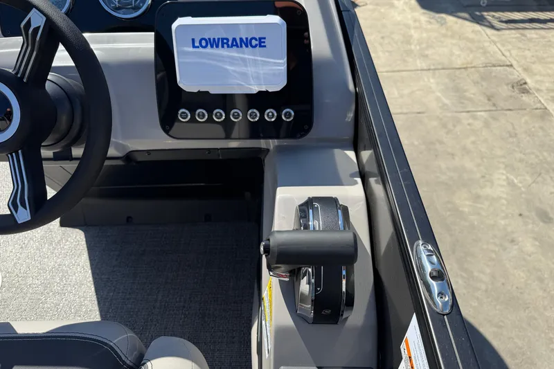 Slide: The Image of Steering console of 2026 Barletta ARIA 22UC with Lowrance display and controls. - 37
